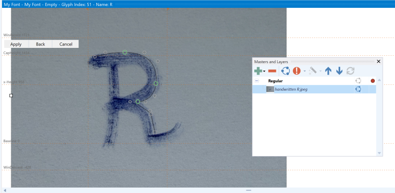 A scanned handwritten letter R loaded as Reference Artwork thta is being reconstructed with outlines in the FontCreator editor.